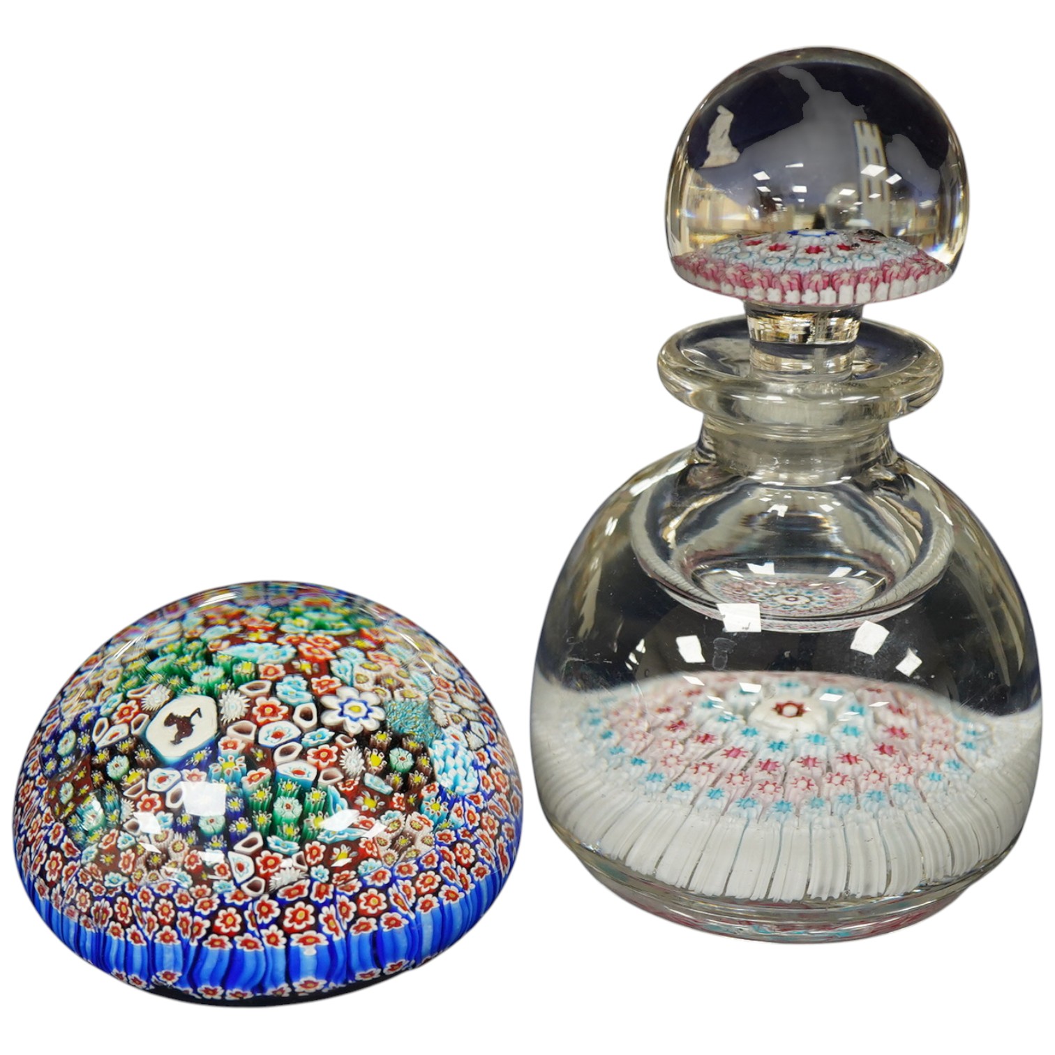 A Whitefriars glass inkwell with stopper and a millefiori glass paperweight, largest 17cm high